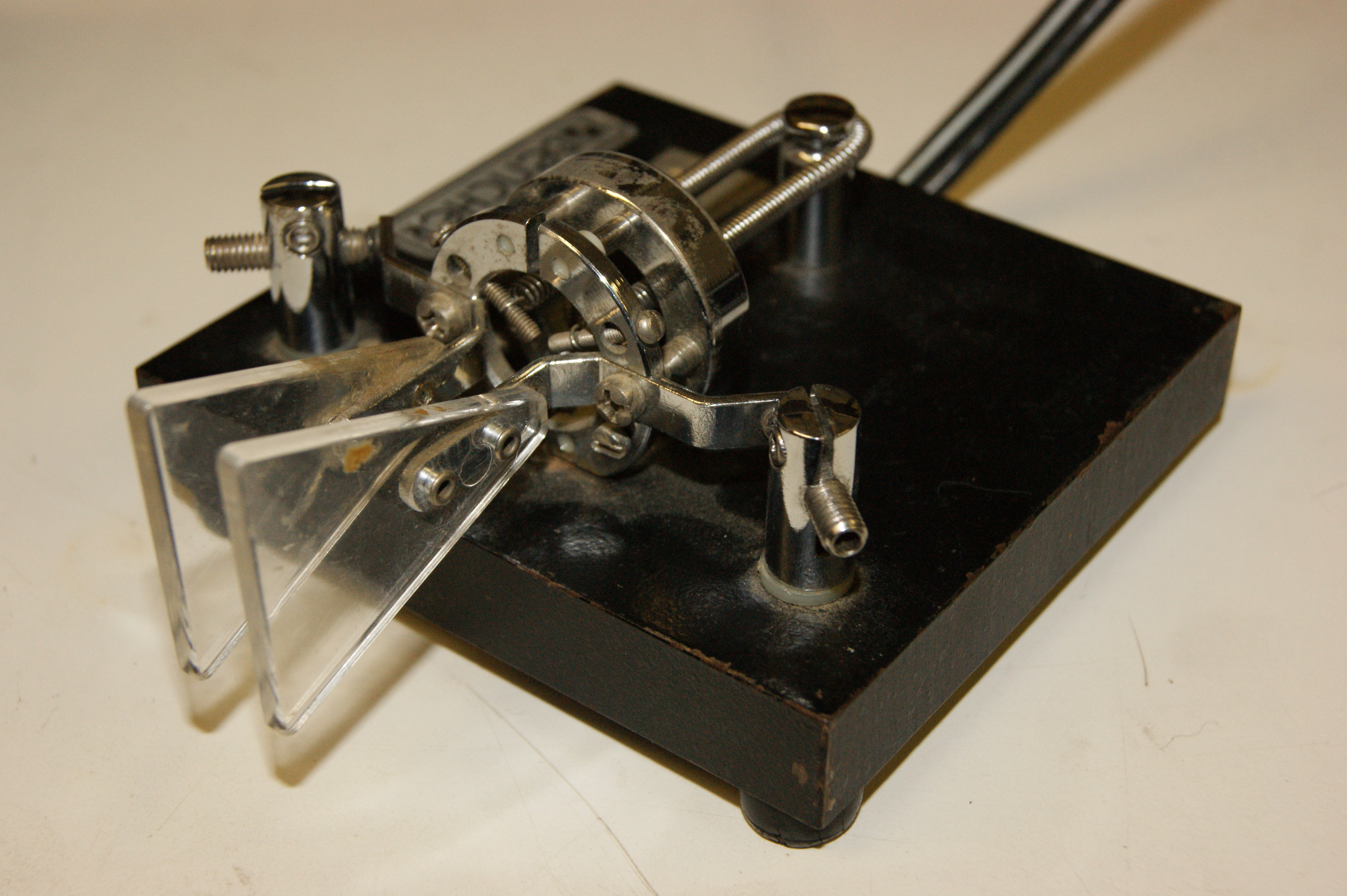 Bencher BY-1 iambic paddle — the canonical CW keyer paddle. Two contacts (dit on one side, dah on the other) feed the keyer logic; on PicoCalc that logic lives in firmware (PicoMite, MicroPython, o…