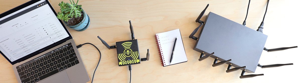 Figure 10.1 — The Mark VII in operation: the puck (here the + AC Tactical variant, with the MK7AC adapter alongside) driven from a laptop's browser, with the Enterprise on the same desk. This is th…