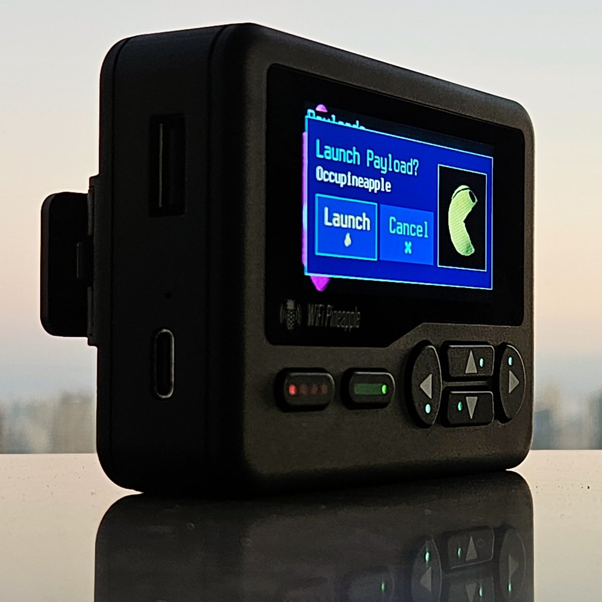 Figure 13.1 — The on-device UI in use: a "Launch Payload?" confirmation dialog on the Pager's screen, driven by the physical buttons — no browser, no second machine. This is the operating model tha…